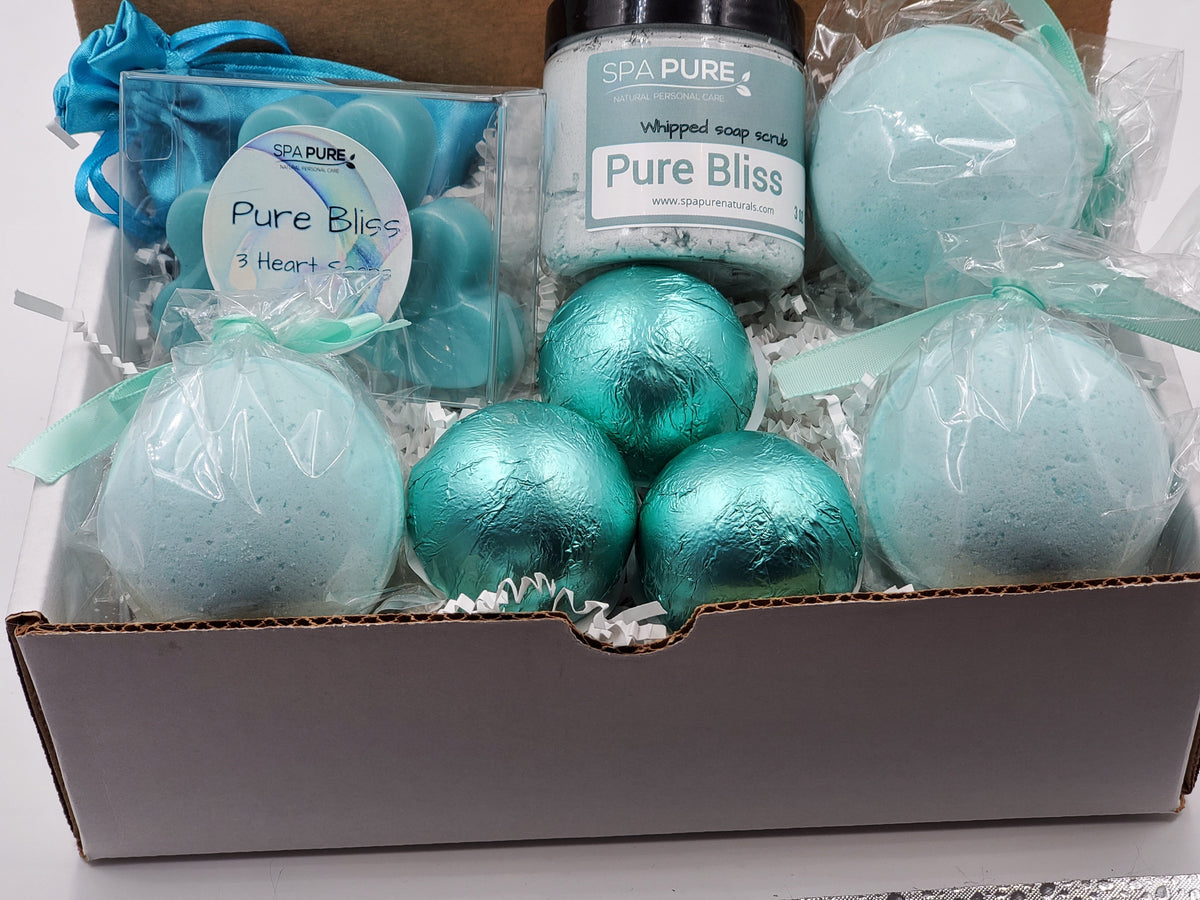 Spa Pure Luxury Spa Kit - Pure Bliss - 3 XL Pure Bliss Bath Fizzies, 3 Pure Bliss shower steamers, 3 Heart-shaped soaps, one 3.5 oz Pure Bliss whipped soap scrub, 1 Roll-on Perfume, Perfect for a mini-spa treatment.