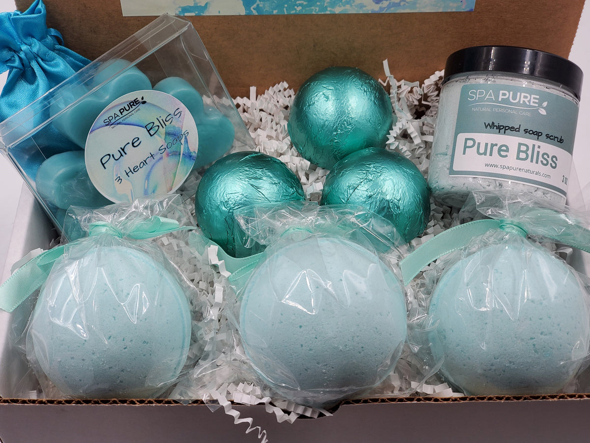 Spa Pure Luxury Spa Kit - Pure Bliss - 3 XL Pure Bliss Bath Fizzies, 3 Pure Bliss shower steamers, 3 Heart-shaped soaps, one 3.5 oz Pure Bliss whipped soap scrub, 1 Roll-on Perfume, Perfect for a mini-spa treatment.